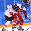 GANGNEUNG, SOUTH KOREA - FEBRUARY 24: Canada's Maxim Noreau #56 gets tangled up with Czech Republic's Tomas Zohorna #79 during bronze medal round action at the PyeongChang 2018 Olympic Winter Games. (Photo by Matt Zambonin/HHOF-IIHF Images)

